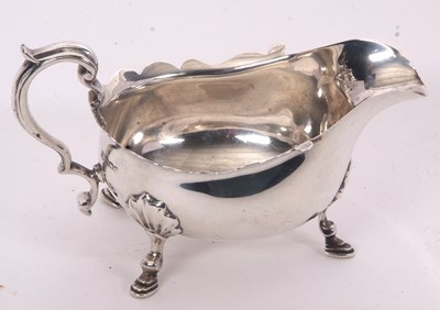 Lot 3 - A George V silver sauce boat of typical form...