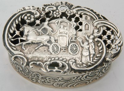 Lot 14 - An Edwardian silver trinket box, the pierced...