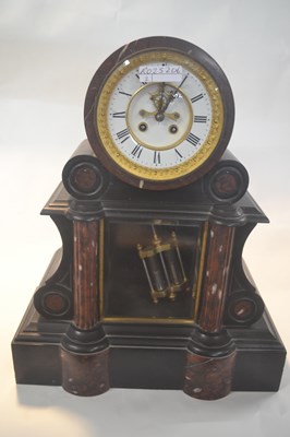 Lot 295 - A Victorian black slated marble cased mantel...