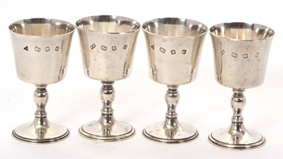Lot 33 - Four Elizabeth II silver goblets, two...
