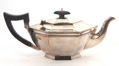 Lot 44 - An Art Deco silver teapot of plain hexagonal...