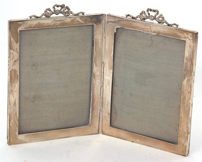 Lot 46 - An Edwardian folding silver double photograph...