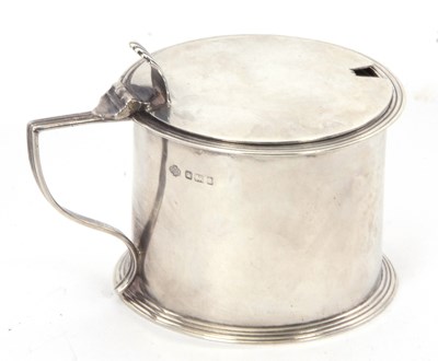 Lot 47 - A George V silver mustard pot and blue glass...