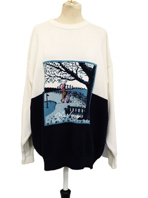 Lot 211 - A Burberry's golfing sweater, in cream and...