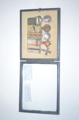 Lot 20 - Framed medal miniatures including Angel of...