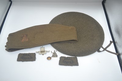 Lot 158 - Beret and cap including badges and buttons the...