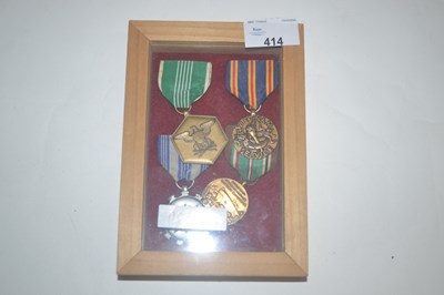 Lot 414 - Frame containing United States service and...