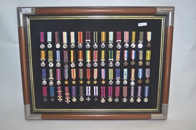 Lot 417 - Comprehensive framed display of British forces...