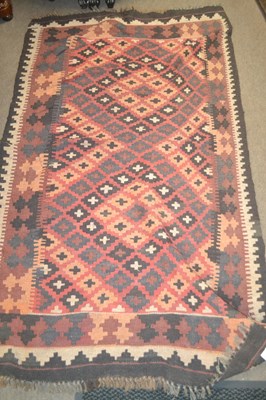 Lot 533 - A small Kelim decorated with a geometric...