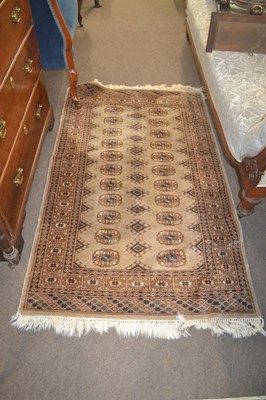 Lot 536 - A small Middle Eastern machine made floor rug,...