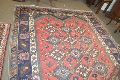 Lot 543 - A 20th Century Middle Eastern wool floor rug...