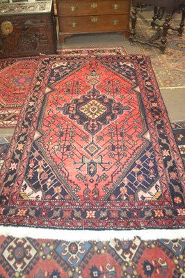 Lot 545 - A 20th Century Turkish wool rug decorated with...