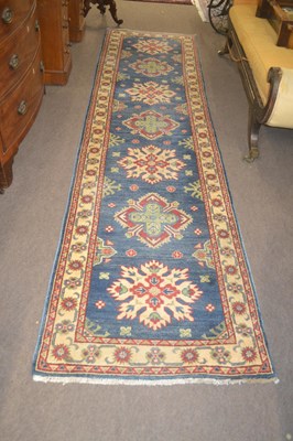 Lot 548 - An Afghan Yakash Kazak runner, wool pile on...