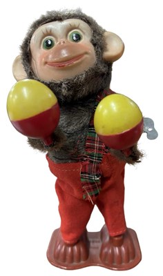 Lot 260 - A clockwork monkey playing the maraccas