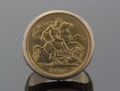 Lot 310 - A half sovereign ring, the 1913 half sovereign...