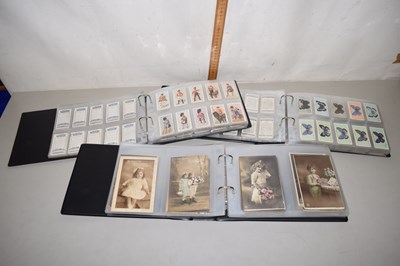 Lot 57 - Three albums of cigarette cards