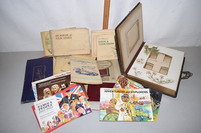 Lot 58 - A group of various albums of vintage cigarette...