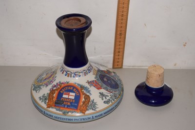Lot 107 - A Wade decanter of British Navy Rum, sealed
