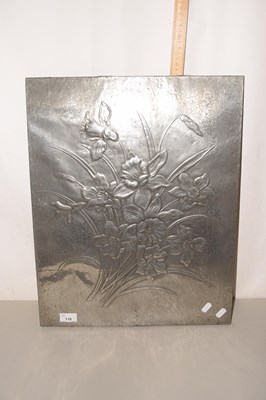Lot 110 - A pressed pewter panel on wooden backing...