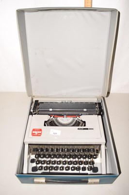 Lot 127 - A vintage Olivetti portable typewriter