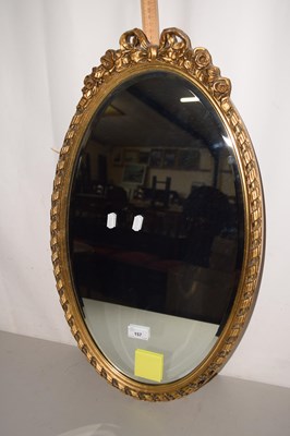Lot 157 - Oval wall mirror in gilt finish frame with...