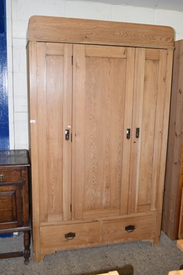 Lot 190 - A late 19th or early 20th Century pine wardrobe