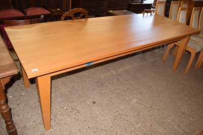 Lot 201 - A modern light oak dining table