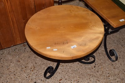 Lot 203 - A modern circular iron framed coffee table