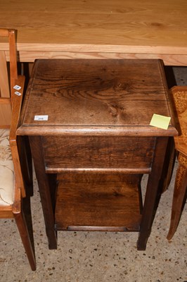 Lot 215 - An early 20th Century oak sewing box