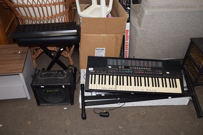 Lot 737 - A Yamaha PSR-215 keyboard, a Casio LK-45...