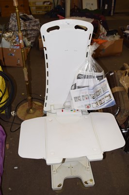 Lot 750 - A bath lift chair