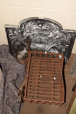 Lot 781 - A fire grate and a cast fire back