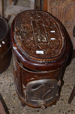 Lot 260 - A French glazed ceramic stove