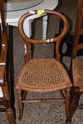 Lot 279 - Balloon back rattan seated chair