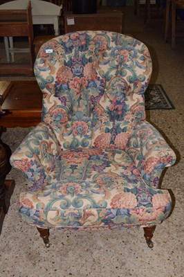 Lot 289 - Floral upholstered buttoned armchair on turned...