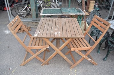 Lot 316 - A garden bistro set, table and two chairs