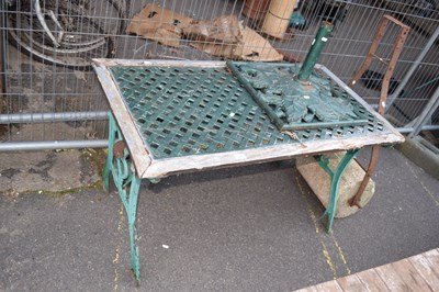 Lot 317 - A wood and metal garden table together with a...