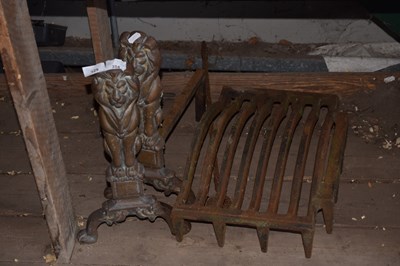 Lot 329 - A brass and iron fire grate with lion decoration
