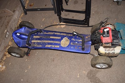 Lot 386 - An off road petrol powered skateboard