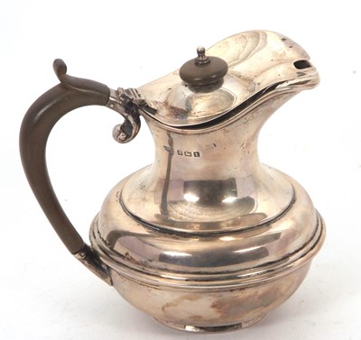 Lot 70 - A Geoge V silver jug of compressed baluster...