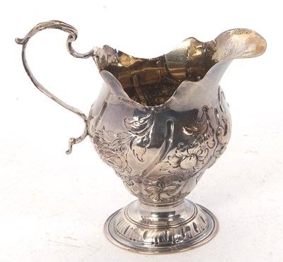 Lot 168 - A Georgian silver cream jug having a round...