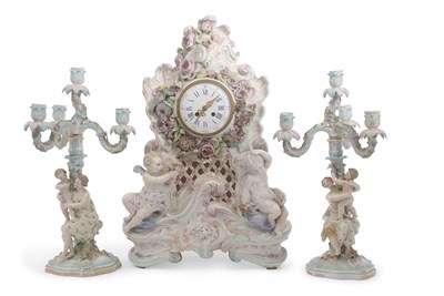 Lot 94 - An impressive continental porcelain clock...