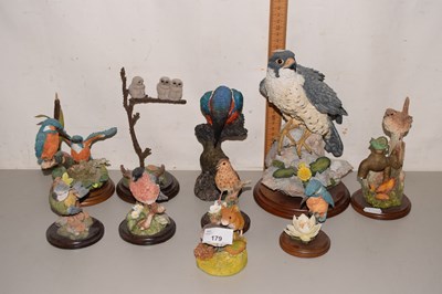 Lot 179 - A collection of various resin bird figures to...