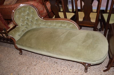 Lot 283 - A Victorian chaise longue with buttoned green...