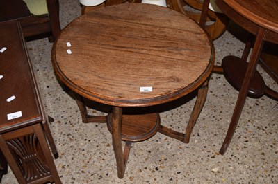 Lot 285 - An Edwardian oak two tier occassional table