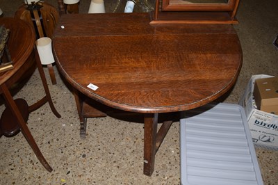 Lot 287 - Early 20th Century narrow drop leaf dining table
