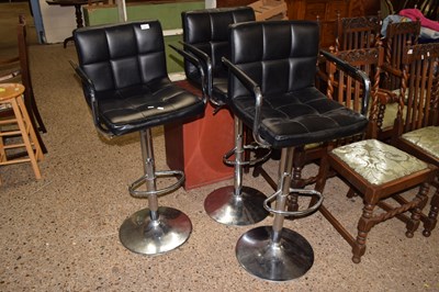 Lot 306 - A set of three bar stools