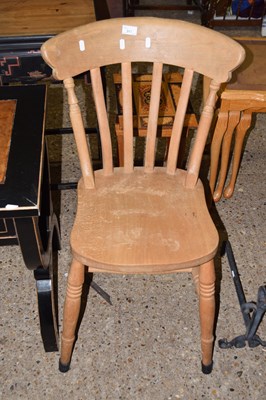 Lot 317 - A beech wood kitchen chair