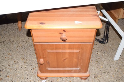 Lot 321 - A pine bedside cabinet