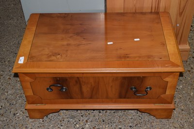Lot 324 - A yew wood veneered television cabinet